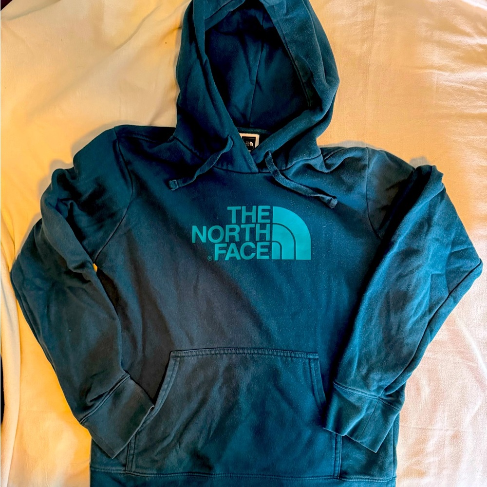 The North Face Dark Teal colored hoodie.